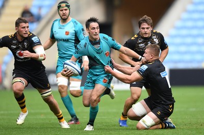 120921 - Wasps v Dragons - Preseason Friendly - Sam Davies of Dragons gets the ball away