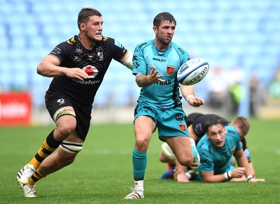 120921 - Wasps v Dragons - Preseason Friendly - Lewis Jones of Dragons gets the ball away