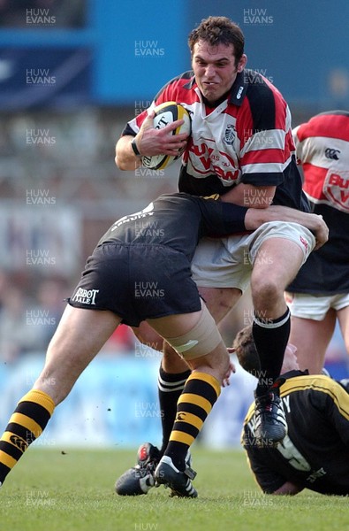 120403 - Wasps v Pontypridd - Parker Pen Cup Semi Final First Leg - Pontypridd's Robert Sidoli tries to go through Kenny Logan