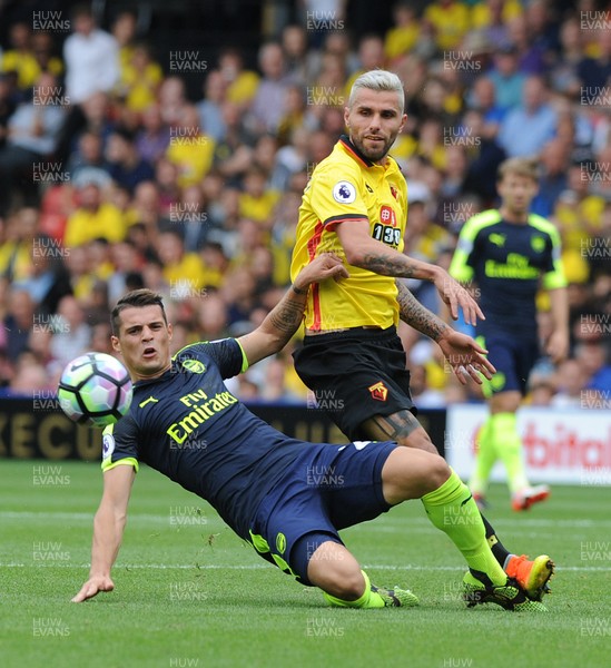 270816 - Watford V Arsenal - PremiershipGranit Xhaka of Arsenal beats Valon Behrami of Watford to the ball