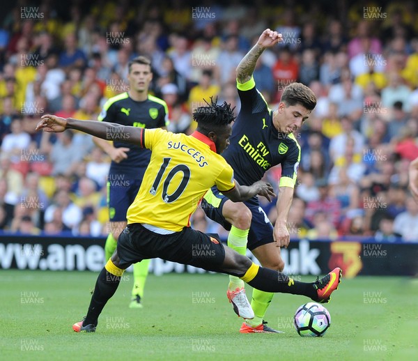 270816 - Watford V Arsenal - PremiershipHector Bellerin of Arsenal is challenged by Isaac Success of Watford