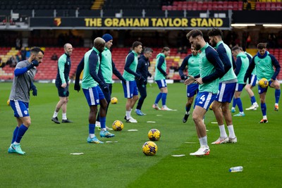 030224 - Watford v Cardiff City - Sky Bet League Championship - Players of Cardiff City warming up