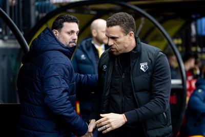 030224 - Watford v Cardiff City - Sky Bet League Championship - Valerien Ismael Manager of Watford  greets Erol Bulut manager of Cardiff City prior to the game