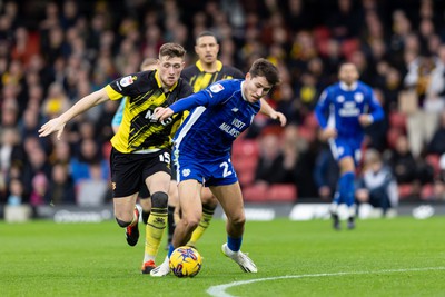 030224 - Watford v Cardiff City - Sky Bet League Championship - Rubin Colwill of Cardiff City is tackled by Mattie Pollock of Watford 