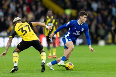 030224 - Watford v Cardiff City - Sky Bet League Championship - Rubin Colwill of Cardiff City is challenged by Matheus Martins of Watford 