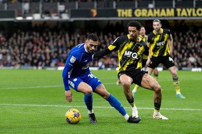 030224 - Watford v Cardiff City - Sky Bet League Championship - Karlan Grant of Cardiff City is challenged by Jamal Lewis of Watford 