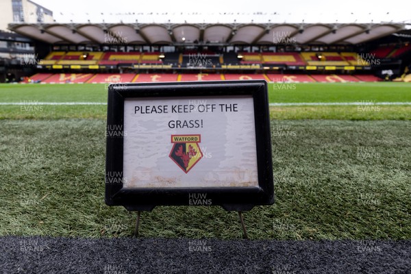 030224 - Watford v Cardiff City - Sky Bet League Championship - Please Keep Off the Grass sign at Vicarage Road