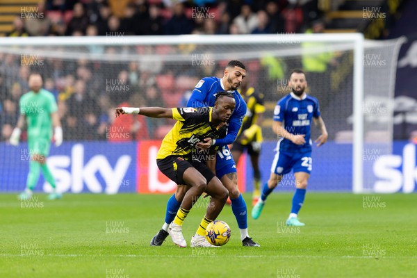 030224 - Watford v Cardiff City - Sky Bet League Championship - Jorge Cabezas of Watford  is challenged by Karlan Grant of Cardiff City