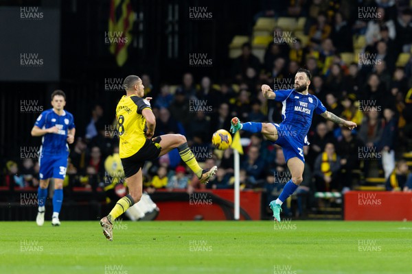 030224 - Watford v Cardiff City - Sky Bet League Championship - Jake Livermore of Watford and Manolis Siopis of Cardiff City battle for the ball