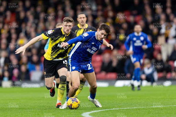 030224 - Watford v Cardiff City - Sky Bet League Championship - Rubin Colwill of Cardiff City is tackled by Mattie Pollock of Watford 