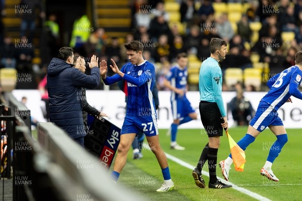 030224 - Watford v Cardiff City - Sky Bet League Championship - Rubin Colwill of Cardiff City greets Erol Bulut manager of Cardiff City after being replaced by David Turnbull of Carfiff City