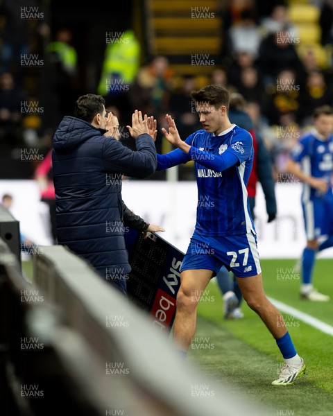 030224 - Watford v Cardiff City - Sky Bet League Championship - Rubin Colwill of Cardiff City greets Erol Bulut manager of Cardiff City after being replaced by David Turnbull of Carfiff City