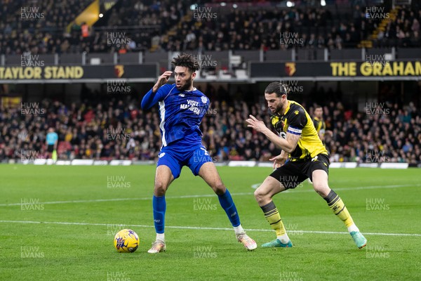 030224 - Watford v Cardiff City - Sky Bet League Championship - Kion Etete of Cardiff City is challenged by Wesley Hoedt of Watford 