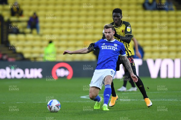 051220 - Watford v Cardiff City - Sky Bet Championship - Joe Ralls of Cardiff City holds off the challenge from Ismaila Sarr of Watford