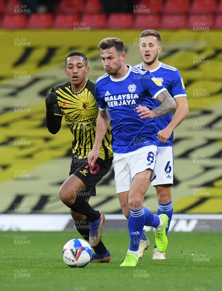 051220 - Watford v Cardiff City - Sky Bet Championship - Joe Ralls of Cardiff City holds off the challenge from Joao Pedro of Watford