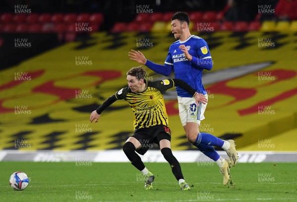 051220 - Watford v Cardiff City - Sky Bet Championship - Kieffer Moore of Cardiff City battles for possession with James Garner of Watford