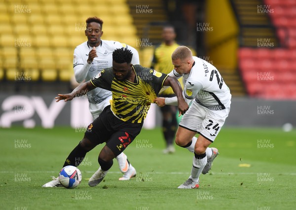 080521 - Watford v Swansea City - Sky Bet Championship - Isaac Success of Watford battles for possession with Jake Bidwell of Swansea City  