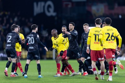 120325 - Watford v Swansea City - Sky Bet League Championship - Edo Kayembe of Watford argues with Liam Cullen of Swansea City