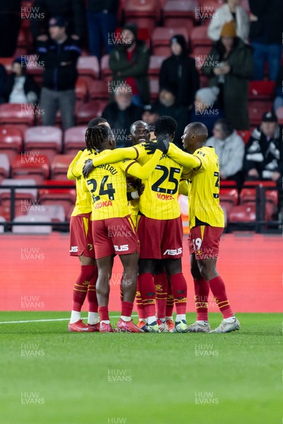 120325 - Watford v Swansea City - Sky Bet League Championship - Moussa Sissoko of Watford celebrates with his teammates after scoring a goal