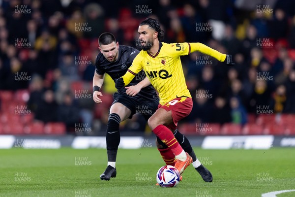 120325 - Watford v Swansea City - Sky Bet League Championship - Imran Louza of Watford is challenged by Zan Vipotnik of Swansea City 