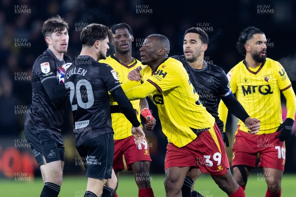 120325 - Watford v Swansea City - Sky Bet League Championship - Edo Kayembe of Watford argues with Liam Cullen of Swansea City