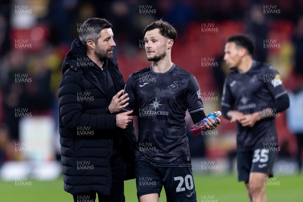 120325 - Watford v Swansea City - Sky Bet League Championship - Alan Sheehan manager of Swansea City talks to Liam Cullen of Swansea City after their side’s defeat