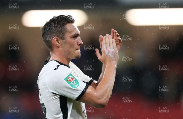 240919 - Watford v Swansea City, Carabao Cup, Third Round - Connor Roberts of Swansea City applauds the fans at the end of the match