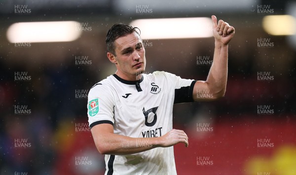 240919 - Watford v Swansea City, Carabao Cup, Third Round - Connor Roberts of Swansea City applauds the fans at the end of the match
