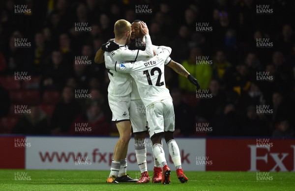 301217 - Watford v Swansea City - Premier League - Jordan Ayew (centre) of Swansea City celebrates his goal with team mates