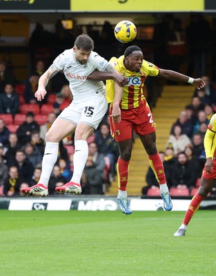 310126 - Watford v Swansea City, EFL Sky Bet Championship - Cameron Burgess of Swansea City and Jeremy Ngakia of Watford compete for the ball