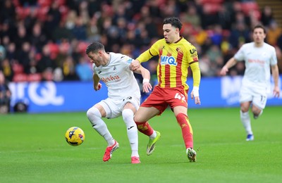 310126 - Watford v Swansea City, EFL Sky Bet Championship - Joel Ward of Swansea City holds off Othmane Maamma of Watford
