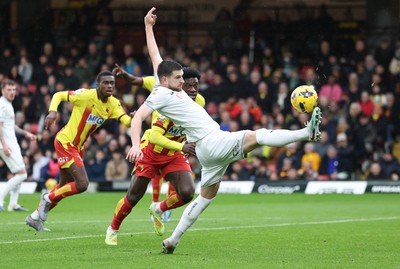 310126 - Watford v Swansea City, EFL Sky Bet Championship - Zan Vipotnik of Swansea City controls the ball as James Abankwah of Watford challenges