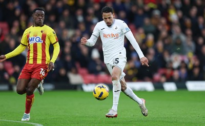 310126 - Watford v Swansea City, EFL Sky Bet Championship - Ronald of Swansea City and Marc Bola of Watford compete for the ball