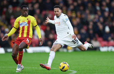 310126 - Watford v Swansea City, EFL Sky Bet Championship - Ronald of Swansea City and Marc Bola of Watford compete for the ball