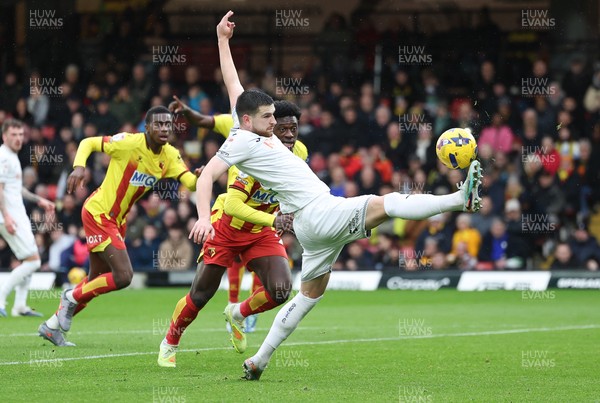 310126 - Watford v Swansea City, EFL Sky Bet Championship - Zan Vipotnik of Swansea City controls the ball as James Abankwah of Watford challenges