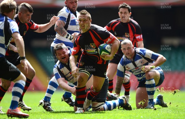 040513 - Wattstown v Fishguard & Goodwick - SWALEC Bowl Final -Dano Roberts of Wattstown looks for a way through 