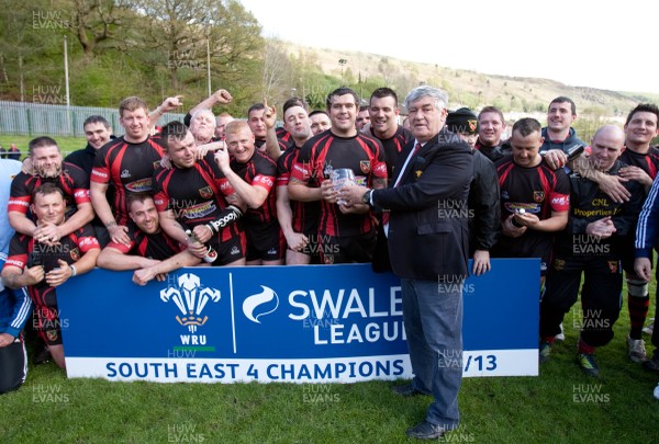 110513 - Wattstown v Pontycymmer, SWALEC League 4 South East - Wattstown RFC captain Nathan Bruford is presented with the SWALEC League 4 South East trophy by WRU board member Humphrey Evans