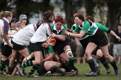 28.03.10 ... Waunarlwydd v Seven Sisters, WRU Women's National Plate Final 2009-10. -  Seven Sisters' Lisa John charges forward 