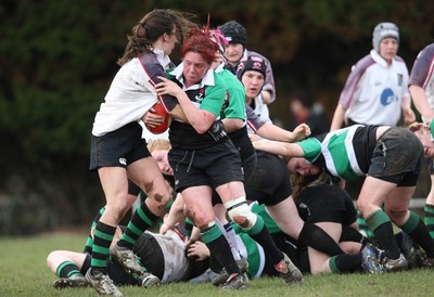 28.03.10 ... Waunarlwydd v Seven Sisters, WRU Women's National Plate Final 2009-10. -  Seven Sisters' Lisa John charges forward 