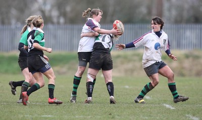 28.03.10 ... Waunarlwydd v Seven Sisters, WRU Women's National Plate Final 2009-10. -  Action from the plate final between Waunarlwydd (white shirts) and Seven Sisters 