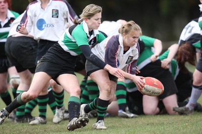 28.03.10 ... Waunarlwydd v Seven Sisters, WRU Women's National Plate Final 2009-10. -  Waunarlwydd Rachel James is tackled by Layla John  