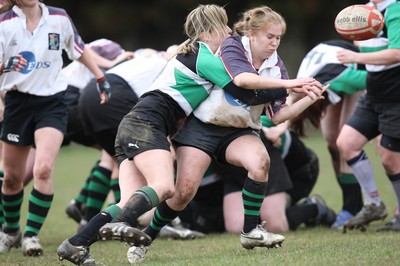 28.03.10 ... Waunarlwydd v Seven Sisters, WRU Women's National Plate Final 2009-10. -  Waunarlwydd Rachel James is tackled by Layla John  