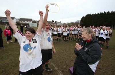 28.03.10 ... Waunarlwydd v Seven Sisters, WRU Women's National Plate Final 2009-10. -  Waunarlwydd's Captain Karen Samuel and Dee Evans are presented with the Plate by Nicola Smith, WRU Women's Community Rugby Manager  