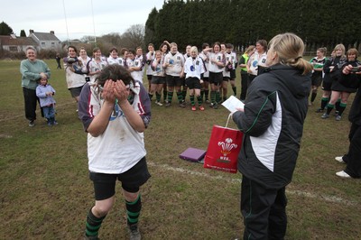 28.03.10 ... Waunarlwydd v Seven Sisters, WRU Women's National Plate Final 2009-10. -  Waunarlwydd's Dee Evans receives a gift from Nicola Smith, WRU Women's Community Rugby Manager to mark her involvement in rugby 