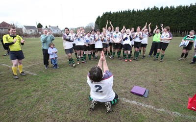 28.03.10 ... Waunarlwydd v Seven Sisters, WRU Women's National Plate Final 2009-10. -  Waunarlwydd's Dee Evans receives a gift from Nicola Smith, WRU Women's Community Rugby Manager to mark her involvement in rugby 