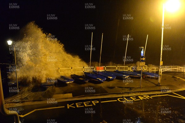 181213 - Weather -Waves crash over the sea front at Penarth, South Wales