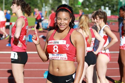 150714 - Welsh Athletics International held at the Cardiff International Sports Stadium - Mica Moore wins 100m Final A