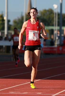 150714 - Welsh Athletics International held at the Cardiff International Sports Stadium - Seren Bundy-Davies wins the Womens 400m Final