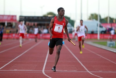 150714 - Welsh Athletics International held at the Cardiff International Sports Stadium - Sam Gordon finishes the last leg to win