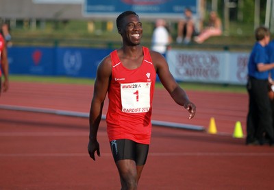 150714 - Welsh Athletics International held at the Cardiff International Sports Stadium - Christian Malcolm thanks the fans after completing his last ever race